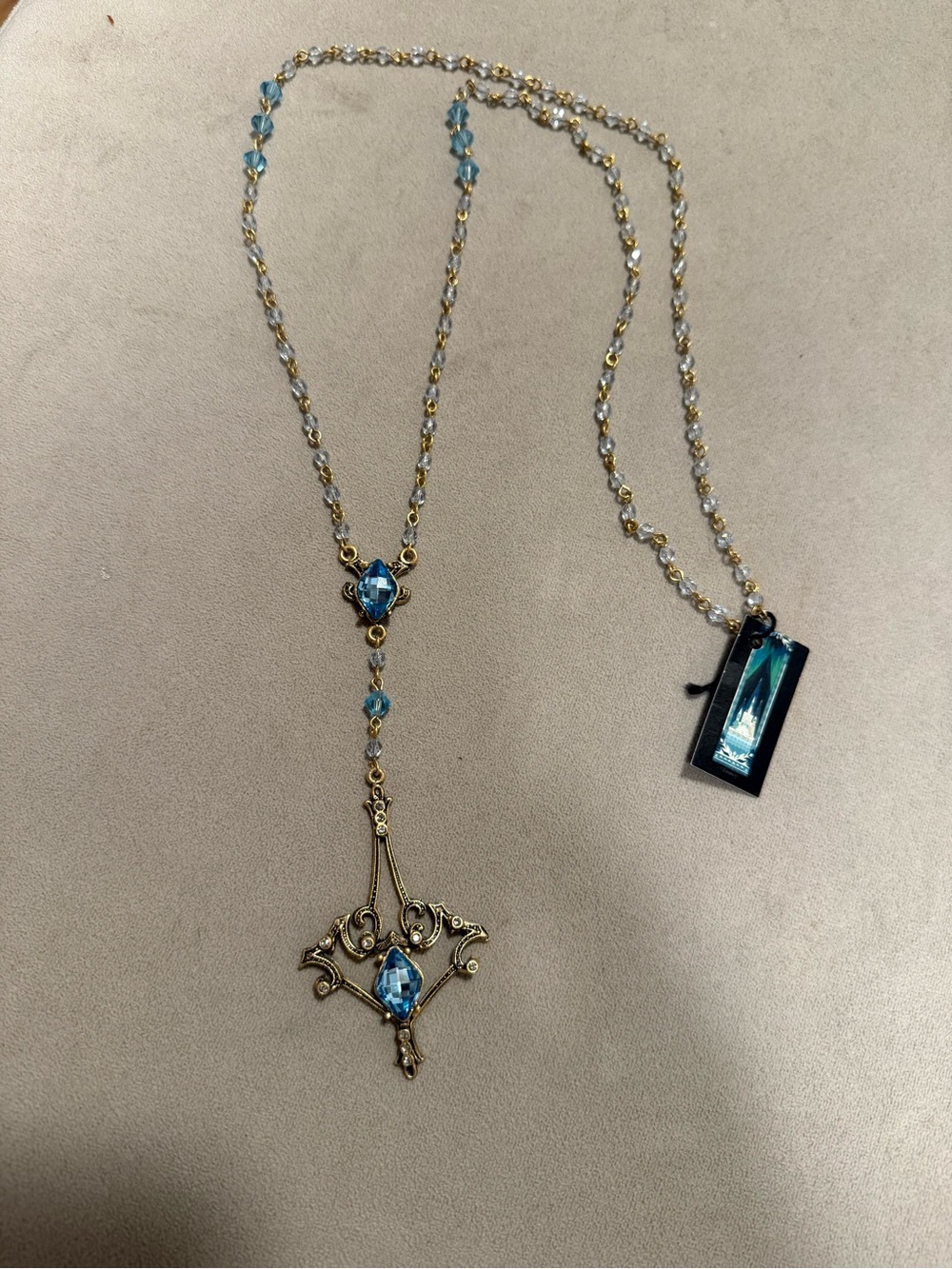 Virgin Saints & Angels RARE Disney Frozen Castle Sapphire color necklace NTW